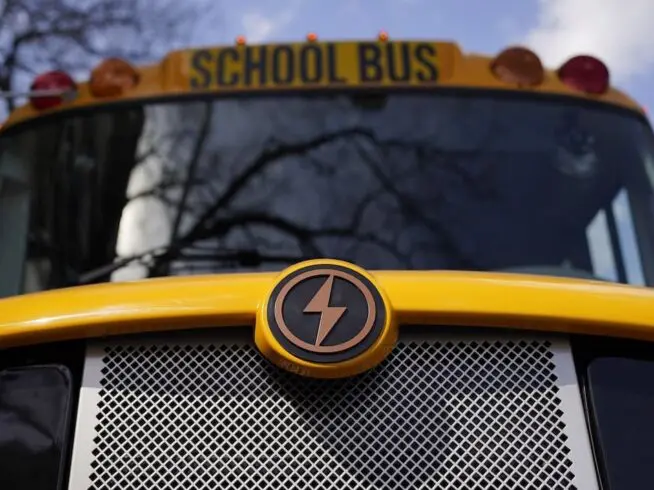 A Lion electric school bus is seen on display in Austin, Texas, Feb. 22, 2023. The Transportation Department is awarding almost $1.7 billion in grants for buying zero and low emission buses, with the money going to transit projects in 46 states and territories. The grants will enable transit agencies and state and local governments to buy 1,700 U.S.-built buses, nearly half of which will have zero carbon emissions. (AP Photo/Eric Gay, File)
